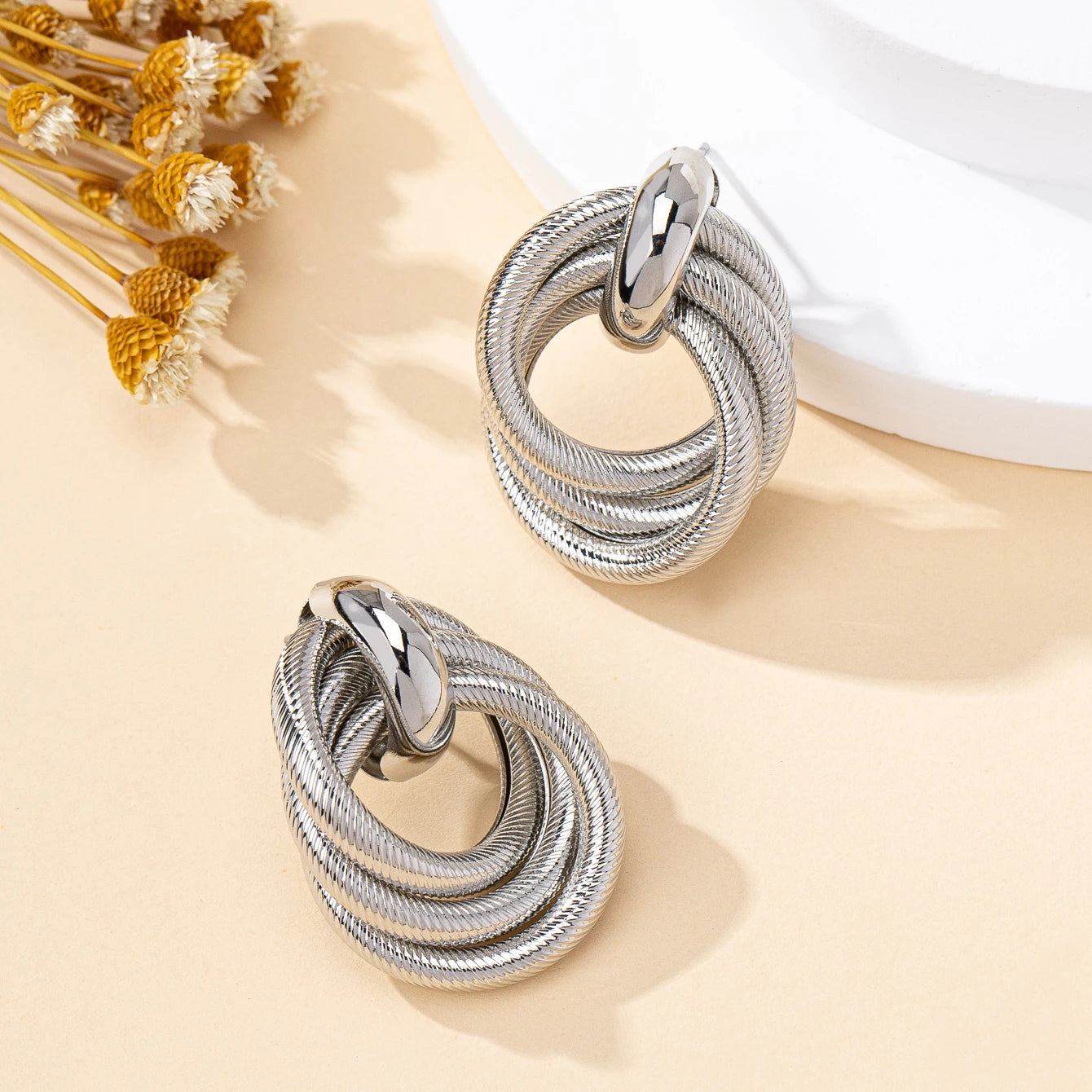 A Pair of Fashionable Bohemian Style Earrings and Jewelry