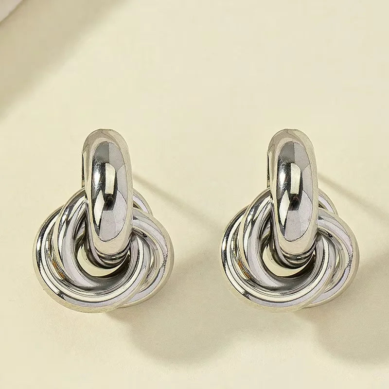 A Pair of Fashionable Bohemian Style Earrings and Jewelry