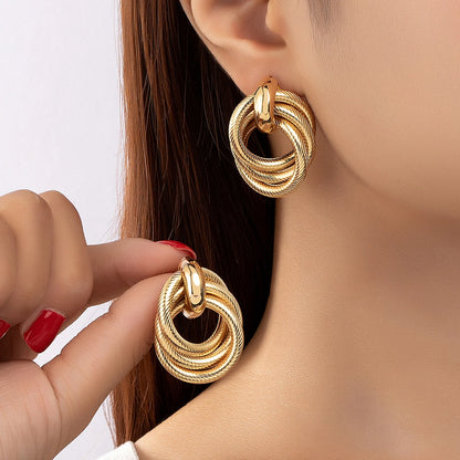 A Pair of Fashionable Bohemian Style Earrings and Jewelry