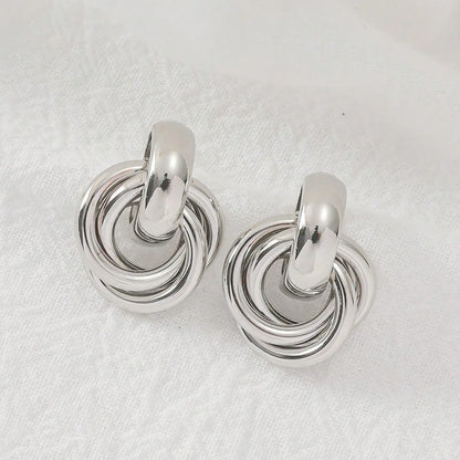 A Pair of Fashionable Bohemian Style Earrings and Jewelry