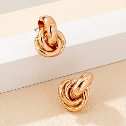 A Pair of Fashionable Bohemian Style Earrings and Jewelry