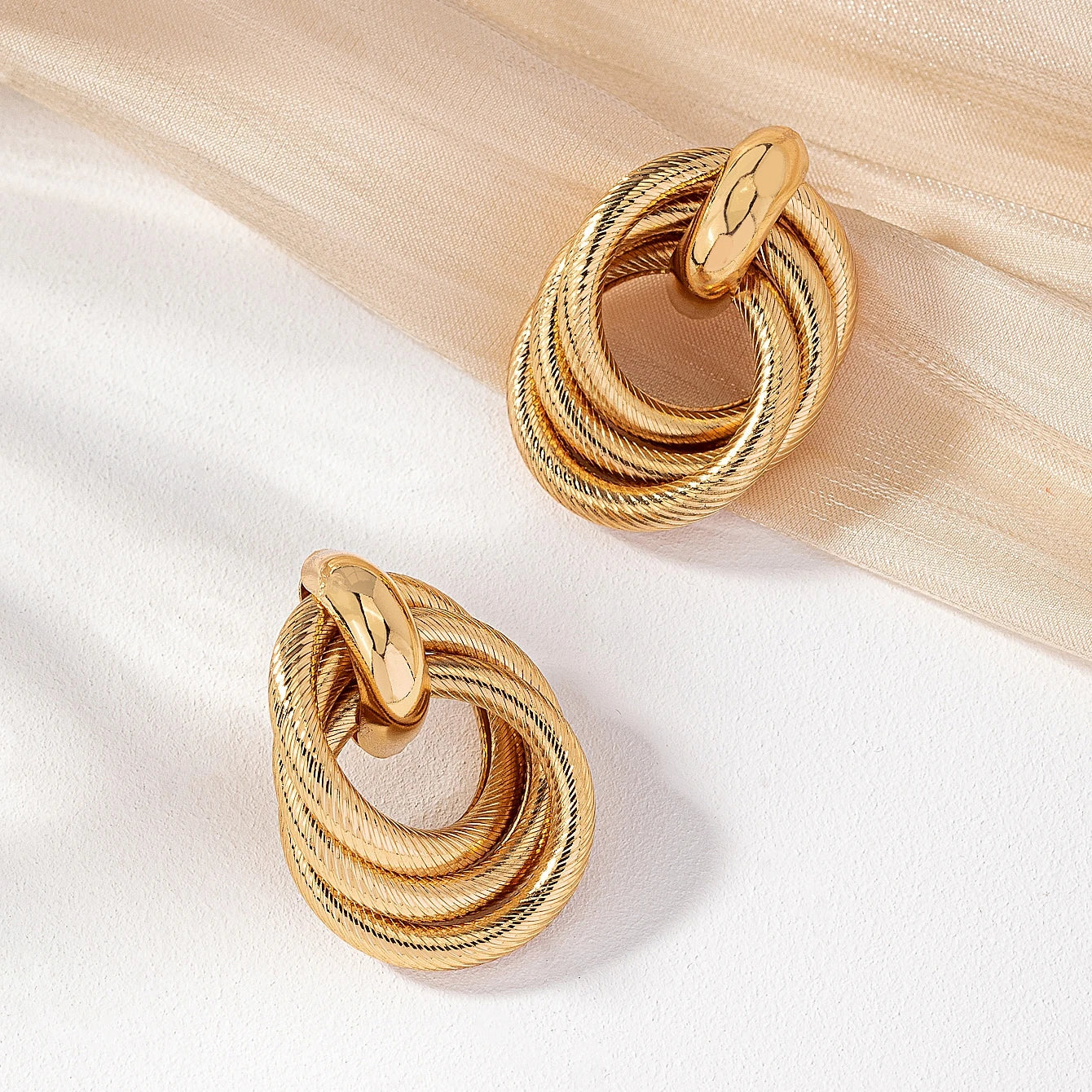 A Pair of Fashionable Bohemian Style Earrings and Jewelry